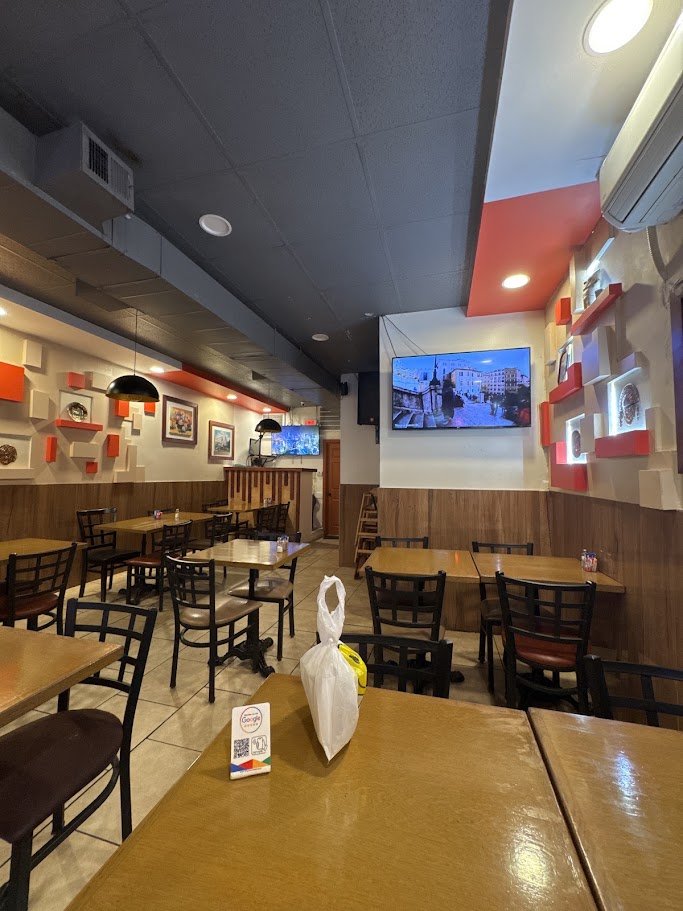 Peruvian restaurant interior with warm lighting.